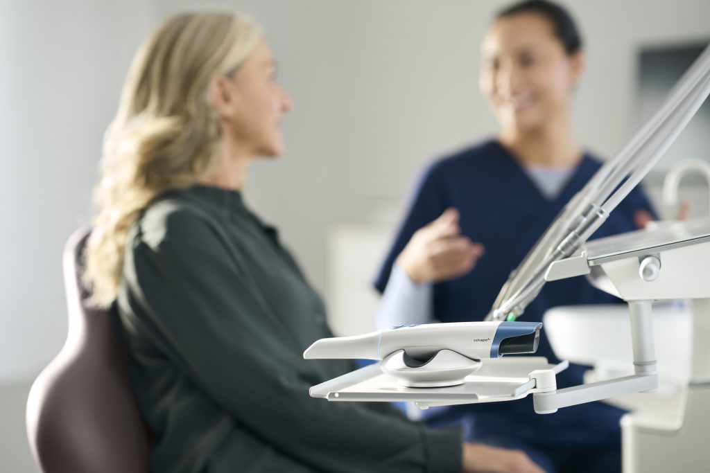 TRIOS 6 on tray during dental consultation