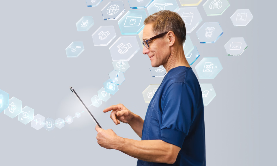 Person using tablet surrounded by digital workflow icons