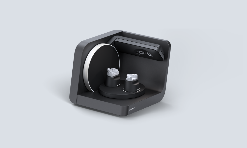 Compact dental scanner with dual impression models inside